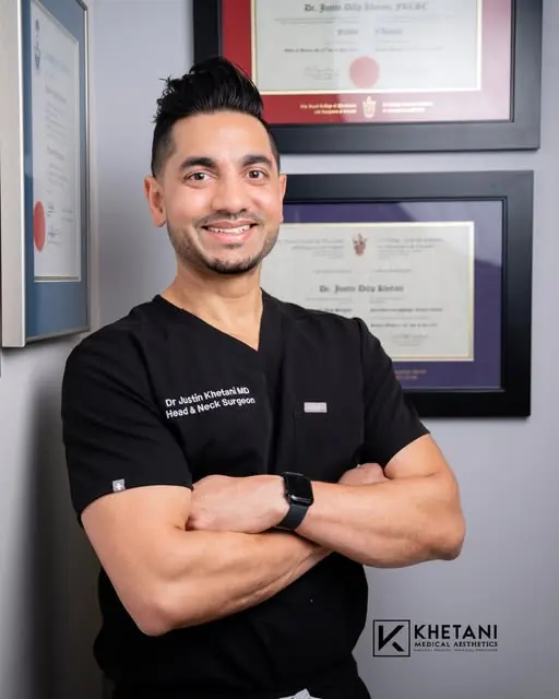 An Instagram photograph of Dr. Justin Khetani in the Burlington office, framed certificates on the wall behind him.