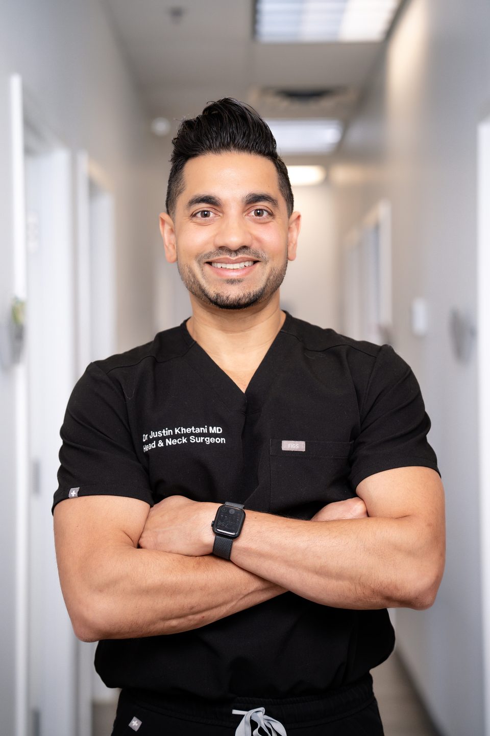 Dr. Justin Khetani, otolaryngologist and rhinologist, in the hallway of the Burlington clinic