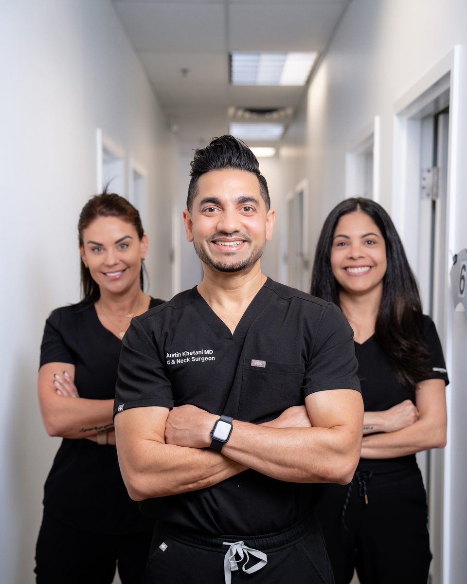 Dr. Justin Khetani with the two members of the Burlington office team